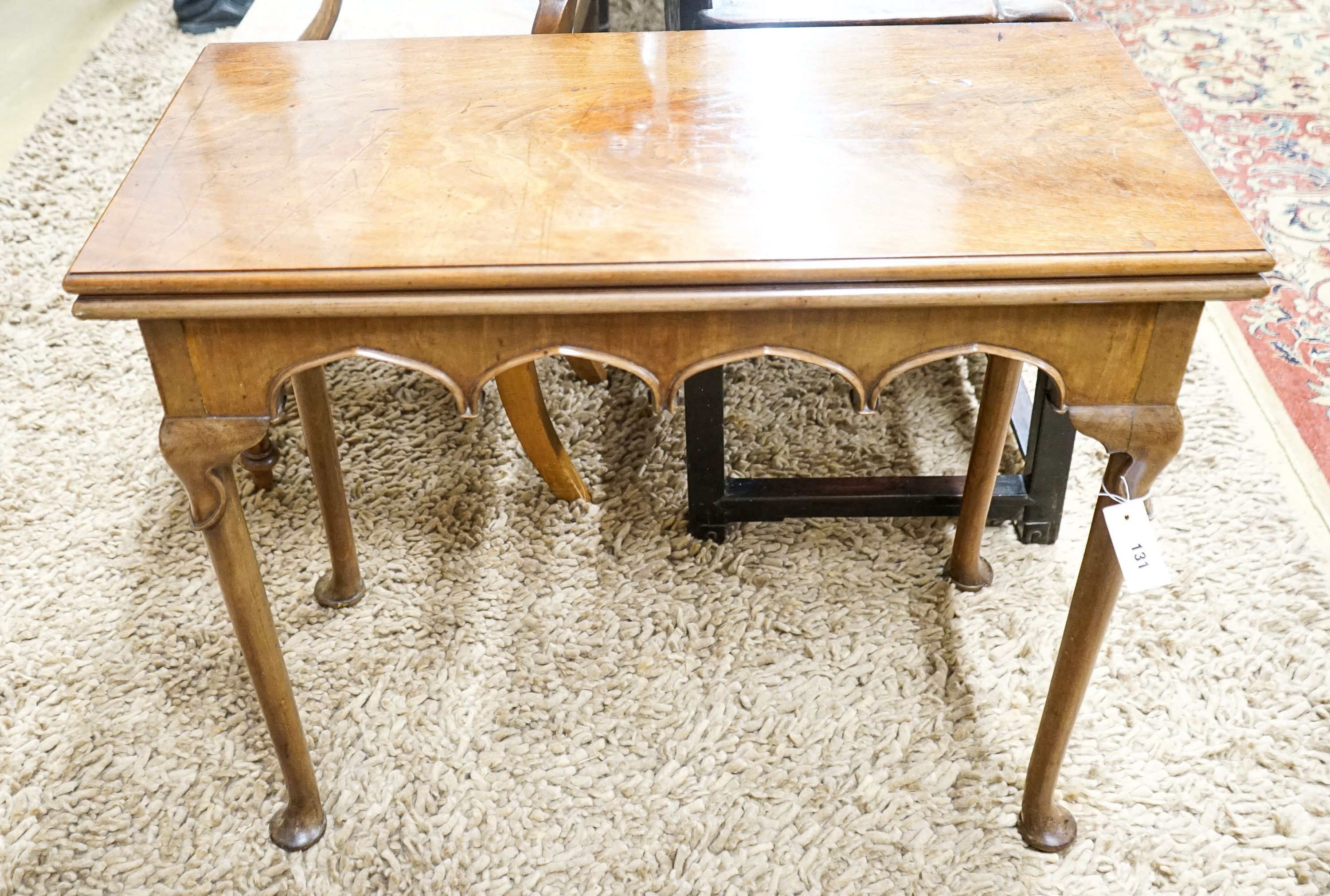 A George II rectangular mahogany folding tea table, width 86cm, depth 40cm, height 73cm